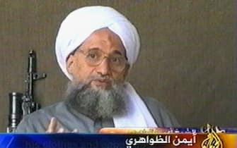 -, -:  A video grab taken 06 July 2006 from the pan-Arab satellite television network al-Jazeera shows al-Qaeda second-in-command Ayman al-Zawahri. In this video produced by the al-Qaeda linked media group Assahab, al-Zawahri claimed, on the eve of the anniversary of the July 7, 2005 London bombings, that a string of attacks will continue and become stronger until forces were pulled out of Afghanistan and Iraq and until financial and military support to America and Israel ended. **QATAR AND INTERNET OUT**  (Photo credit should read -/AFP via Getty Images)