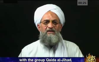 -, -:  QATAR AND INTERNET OUT A frame grab from a videotape aired 05 August 2006 on the Qatar-based Al-Jazeera television network shows Al-Qaeda second-in-command Ayman Al-Zawahiri at an undisclosed place and time. Al-Zawahiri today announced that Egypt's Jamaa Islamiya militant group had formally joined the global terror network. AFP PHOTO/AL-JAZEERA  (Photo credit should read -/AFP via Getty Images)