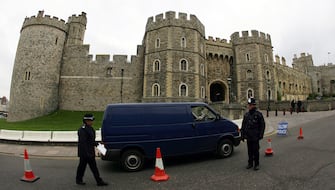 WINDSOR, ENGLAND - MARCH 8: Police search a van entering the castle where preperations are being made before the wedding between The Prince of Wales and Mrs. Camilla Parker-Bowles which is due to be held tomorrow in the Berkshire town on March 8, 2005 in Windsor, England.  (Photo by Julian Herbert / Getty Images)