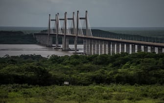 CIUDAD GUAYANA, VENEZUELA - JULY 8, 2015 - Orinoquia Bridge, over the Orinoco river, connects Bolivar and Anzoátegui states. It was built by the Brazilian company Odebrecht and the Venezuelan Ministry of Infrastructure. Contruction began in 2001 and it was inaugurated on November 13, 2006. Venezuelan President Hugo Chávez and Brazilian President Luiz Inácio Lula Da Silva were both in attendance.  PHOTO: Meridith Kohut for Bloomberg News