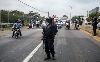 22 January 2023, Mexico, Veracruz: Police officers secure the area where a serious armed confrontation occurred in the Mexican city of Veracruz, killing several people, including two minors. Photo: Felix Marquez/dpa (Photo by Felix Marquez/picture alliance via Getty Images)