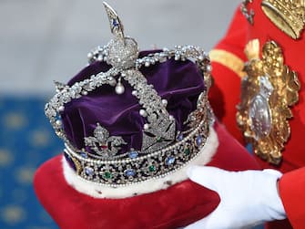 LONDON, ENGLAND - MAY 27:   Queen Elizabeth's Imperial State Crown arrives at the State Opening of Parliament in the House of Lords, at the Palace of Westminster on May 27, 2015 in London, England. (Photo Eddie Mulholland - WPA Pool/Getty Images)