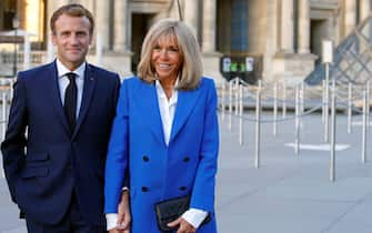 PARIS, FRANCE - SEPTEMBER 27: French President, Emmanuel Macron and his wife Brigitte Macon pose prior to the inauguration of the exhibition "Paris-Athens. Birth of Modern Greece "at the Louvre Museum, this inauguration will be followed by a working dinner at the Elysee Palace on September 27, 2021 in Paris France. Ten days after the humiliation in the Australian submarine affair, Emmanuel Macron and Greek Prime Minister Kyriakos Mitsotakis met on Monday to discuss the purchase of four new generation frigates by Greece. The amount of the contract, if it were signed, would be of the order of 5 billion euros. (Photo by Chesnot/Getty Images)