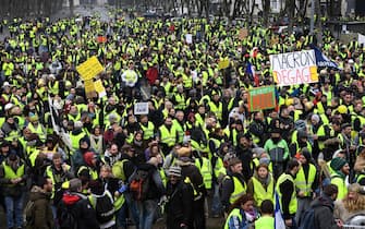 People gather during an anti-government demonstration called by the Yellow Vests "Gilets Jaunes" movement, in Bourges on January 12, 2019. - France braced for a fresh round of "yellow vest" protests on January 12, 2019 across the country with the authorities vowing zero tolerance for violence after weekly scenes of rioting and vandalism in Paris and other cities over the past two months. (Photo by Alain JOCARD / AFP) (Photo by ALAIN JOCARD/AFP via Getty Images)