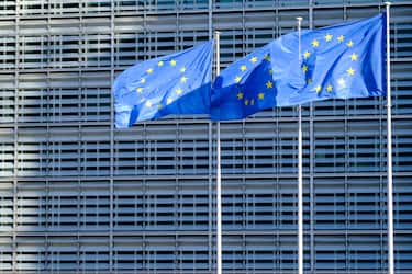 BRUSSELS, BELGIUM - SEPTEMBER 24: THree EU flags are seen in front of the Berlaymont on September 24, 2020 in Brussels, Belgium. The Berlaymont building is the headquarters of the European Commission, in Brussels, at the confluence of rue de la Loi and boulevard Charlemagne. It houses the offices of the President of the European Commission and the twenty-seven European Commissioners. (Photo by Thierry Monasse/Getty Images)