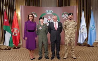 epa08122830 A handout photo made available by the Royal Hashemite Court shows (R-L) Jordan's Crown Prince Al Hussein bin Abdullah II, King Abdullah II of Jordan, Princess Salma bint Abdullah and Queen Rania of Jordan posing for a photograph after receiving her wings, making her officially the first female military pilot of Jordan, in Amman, Jordan, 08 January 2020 (issued 12 January 2020). According to local media reports Princess Salma had graduated from the Royal Military Academy Sandhurst in November from a short Commissioning Course, she then completed her pilot training.  EPA/ROYAL HASHEMITE COURT HANDOUT  HANDOUT EDITORIAL USE ONLY/NO SALES