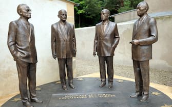 A picture taken on July 4, 2013  in Scy-Chazelle, eastern France shows a sculpture representing (LtoR)Konrad Adenauer, Robert Schuman, Alcide De Gasperi and Jean Monnet, founders of the European Union. 
AFP PHOTO / JEAN-CHRISTOPHE VERHAEGEN        (Photo credit should read JEAN-CHRISTOPHE VERHAEGEN/AFP via Getty Images)