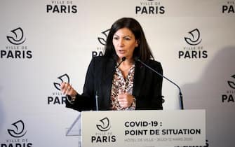 epa08288790 Mayor of Paris and seeking re-election, Anne Hidalgo (C) speaks during a press conference about security measures due to the coronavirus outbreak ahead of the 2020 Paris municipal election, at the City Hall of Paris, France, 12 March 2020. Municipal elections will be held across France on 15 and 22 March 2020 for the first and second rounds of voting, respectively. At least 2,281 cases of COVID-19 infections and 48 deaths have been confirmed so far in France.  EPA/CHRISTOPHE PETIT TESSON