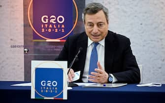 Italian Prime Minister Mario Draghi attends a press conference after the G20 Extraordinary Leader's Meeting on Afghanistan at Palazzo Chigi, in Rome, Italy, 12 October 2021. ANSA/RICCARDO ANTIMIANI