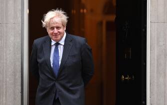 epa09278847 British Prime Minister Boris Johnson looks on ahead of a meeting with Crown Prince Salman bin Hamad Al Khalifa of Bahrain at 10 Downing Street in London, Britain, 17 June 2021. EPA / ANDY RAIN