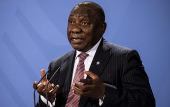 epa09432771 President of the South Africa Cyril Ramaphosa attends a press conference after the G20 Compact with Africa conference at the Chancellery in Berlin, Germany, 27 August 2021.  EPA/MAJA HITIJ / POOL