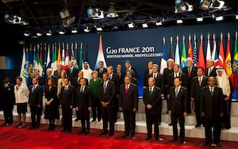 epa02991096 Heads of State and Government pose for the group picture at the G20 summit in Cannes, France, 03 November 2011. On 03 and 04 November 2011, the heads of state of the leading world economies (G20) meet for this year's summit.  EPA/PEER GRIMM