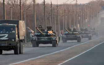 A column of tanks marked with the Z symbol stretches into the distance as they proceed northwards along the Mariupol-Donetsk highway. The battle between Russian / Pro Russian forces and the defencing Ukrainian forces lead by Azov battalion continues in the port city of Mariupol.