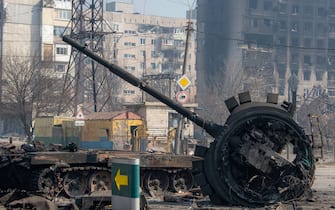 A destroyed tank likely belonging to Russia / pro-Russian forces lies amidst rubble in the north of the ruined city. The battle between Russian / Pro Russian forces and the defencing Ukrainian forces lead by Azov battalion continues in the port city of Mariupol. (Photo by Maximilian Clarke / SOPA Images/Sipa USA)