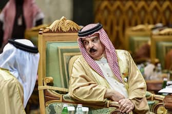 King Hamad bin Isa Al Khalifa of Bahrain, speaks with another delegate during the 40th Gulf Cooperation Council (GCC) summit held at the Saudi capital Riyadh on December 10, 2019. (Photo by Fayez Nureldine / AFP) (Photo by FAYEZ NURELDINE/AFP via Getty Images)