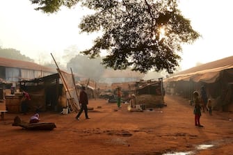 The "petit seminaire" (small seminary) Internally Displaced People (IDP) camp in Bangassou, where 2000 muslim have been living for almost three years, on February 13th 2020. - In May 2017, a column of anti-Balaka Christian militiamen swept through Bangassou, which until then had been relatively untouched by the civil war that had ravaged the rest of the country since 2013, killing at least 72 Muslim civilians and 12 peacekeepers in a matter of days, according to the UN. 
The attackers accused their civilian victims of complicity with the Sel√©ka rebellion, a predominantly Muslim coalition that overthrew the regime of President Fran√ßois Boziz√© in 2013 and plunged the Central African Republic into a spiral of inter-community clashes. 
For this massacre, five leaders of these anti-Balaka militias were sentenced on 7 February to forced labour for life in Bangui for crimes against humanity. A historic verdict in a country that has broken with impunity. (Photo by CAMILLE LAFFONT / AFP) (Photo by CAMILLE LAFFONT/AFP via Getty Images)