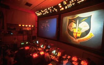 The Command Post of the North American Air Defense Command (NORAD) Cheyenne Mountain Complex. Computer-generated images are projected on two large display screens. | Location: Peterson Air Force Base, Colorado, USA. (Photo by © CORBIS/Corbis via Getty Images)