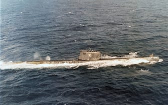 (Original Caption) US Navy Aircraft photograph of a Soviet attack submarine as it moved along the surface in vicinity of Cuban quarantine operations during the Cuban Missile Crisis.