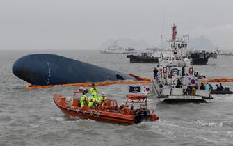 The rescue work and search for the missing continue at the site of ferry disaster off the coast of Jindo Island on April 17, 2014 in Jindo-gun, South Korea. Six are dead, and 290 are missing as reported. The ferry identified as the Sewol was carrying about 470 passengers, including the students and teachers, traveling to Jeju Island.