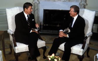Oct. 10, 1981 - Washington DC, USA - President RONALD W. REAGAN (left) meets with former President JIMMY CARTER in the Oval Office today. The two men met for more than thirty five minutes to discuss world matters. Former President Carter announced that he was supporting Reagan on the AWACS sale of surveillance planes to Saudia-Arabia. Carter was one of three ex-presidents who represented the U.S. at the Anwar Sadat funeral in Cairo on Saturday. (Credit Image: © Keystone Press Agency/Keystone USA via ZUMAPRESS.com)