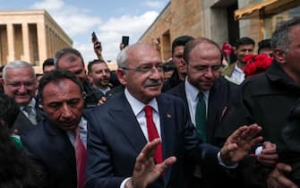 epa10624760 Turkish presidential candidate Kemal Kilicdaroglu (C), leader of the opposition Republican People's Party (CHP), gestures as he visits Anitkabir, the mausoleum of the founder and first President of the Republic of Turkey, Mustafa Kemal Ataturk, in Ankara, Turkey, 13 May 2023. Turkey will hold its general election on 14 May 2023 with a two-round system to elect its president, while parliamentary elections will be held simultaneously.  EPA/SEDAT SUNA