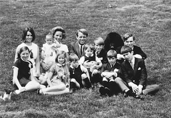 (Original Caption) Robert Kennedy with his wife and their ten children. Ca. 1965. Filed, 4/30/1982.
