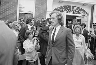 (Original Caption) Joseph Patrick Kennedy II, eldest son of the late Senator Robert Kennedy (left), is followed from Nantucket District Court by his mother, Mrs. Ethel Kennedy, and uncle, U.S. Senator Edward M. Kennedy (8/20). Kennedy, 21, was convicted on a negligent driving charge resulting from an accident on the island (8/13) in which his brother David and two girls were injured. He received a $100 dollar fine.
