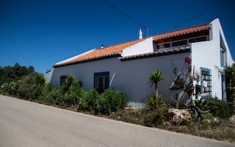 1217764199 Picture shows the house where a German suspect, related to the Briton Madeleine McCann case, was living when the three-year-old girl disappeared in 2007, near Lagos, Portugal, on June 5, 2020. - Portuguese justice said to be questioning witnesses as part of the investigation into the 2007 disappearance of the British girl Madeleine McCann, whose case re-emerged on May 3, 202 with the identification of a new German suspect. (Photo by CARLOS COSTA / AFP) (Photo by CARLOS COSTA/AFP via Getty Images)