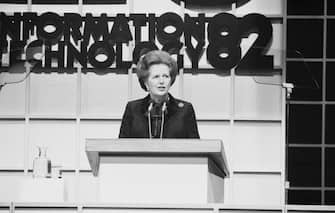 British Conservative Party politician and Prime Minister of the United Kingdom Margaret Thatcher (1925 - 2013) speaking at the opening conference on Information Technology held at the Barbican Centre, London, UK, 8th December 1982. (Photo by Hilaria McCarthy/Daily Express/Hulton Archive/Getty Images)