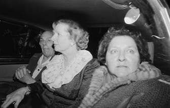 British Prime Minister Margaret Thatcher and her husband Denis (1915 - 2003) leave the Grand Hotel in Brighton, after a bomb attack by the IRA, 12th October 1984. With them in the car is Margaret's friend and aide Cynthia Crawford. They and many other politicians were staying at the hotel during the Conservative Party conference, but most were unharmed. (Photo by John Downing/Getty Images)