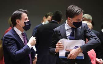 Italian Prime Minister Giuseppe Conte (L) and Dutch Prime Minister Mark Rutte (R) are pictured prior the European Union Council in Brussels on July 17, 2020, as the leaders of the European Union hold their first face-to-face summit over a post-virus economic rescue plan. - The EU has been plunged into a historic economic crunch by the coronavirus crisis, and EU officials have drawn up plans for a huge stimulus package to lead their countries out of lockdown. (Photo by STEPHANIE LECOCQ / POOL / AFP) (Photo by STEPHANIE LECOCQ/POOL/AFP via Getty Images)