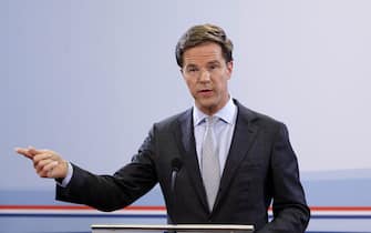 New Dutch prime minister Mark Rutte gives his first press conference as Premier on October 14, 2010 in The Hague. The new Dutch Prime Minister, conservative liberal leader Mark Rutte, unveiled today the cabinet of his coalition minority government, which is formally backed by anti-Islam MP Geert Wilders. "The prime minister and his cabinet ministers were sworn in" by Queen Beatrix in a private ceremony at her working palace in The Hague, government spokesman Henk Brons said. AFP PHOTO / ANP - PHIL NIJHUIS  = netherlands out - belgium out (Photo credit should read PHIL NIJHUIS/AFP via Getty Images)