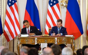 PRAGUE, CZECH REPUBLIC - APRIL 08:  U.S. President Barack Obama (L) and Russian President Dmitry Medvedev sign the latest nuclear arms reduction treaty between the two countries, known as "new START", at Prague Castle on April 8, 2010 in Prague, Czech Republic. The treaty provides for a reduction in the two countries' arsenals to 1,550 warheads over seven years and is the most significant arms agreement between the U.S. and Russia in nearly twenty years.  (Photo by Getty Images)