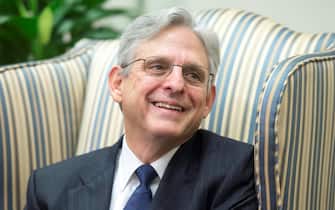 epa08922947 (FILE) - Then Supreme Court nominee, Merrick Garland, Chief Judge, US Court of Appeals, DC Circuit, meets with Democratic Senator from Indiana, on Capitol Hill in Washington DC, USA, 28 March 2016 (Reissued 06 January 2021). According to reports on 06 January, President-elect Joe Biden will nominate Merrick Garland to become the next US Attorney General.  EPA/MICHAEL REYNOLDS *** Local Caption *** 52671556