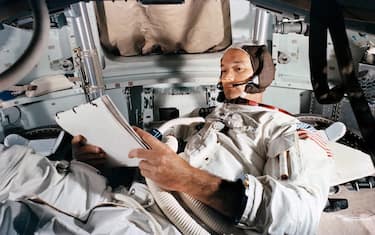 epa09165748 A handout photo made available by the NASA shows Command Module (CM) pilot Michael Collins practices in the CM simulator at Kennedy Space Center, Florida, USA, 19 June 1969 (issued 28 April 2021). The Apollo 11 crew astronaut Michael Collins has died at the age of 90, his familly announced in a statement on 28 April 2021.  EPA/NASA HANDOUT  HANDOUT EDITORIAL USE ONLY/NO SALES