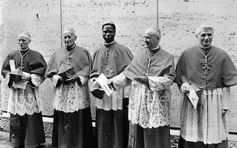 Picture dated 07 June 1977 shows German cardinal Joseph Ratzinger (R) at the Vatican city next to Cardinals Benelli (2ndR), Gantin (C), Tomazek (2ndL) and Gappi (L). German Cardinal Joseph Ratzinger, who was elected 19 April 2005 to succeed Pope John Paul II, was a close confidant of the late pontiff and fellow conservative. The newly elected Pope Benedict XVI, who turned 78 on Saturday, will be expected to maintain John Paul II's deeply conservative line. He has railed against "greed" and "self-sufficiency" within the Roman Catholic Church and rejects any attempt to modernise.        (Photo credit should read STF/AFP via Getty Images)
