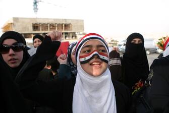 Proteste in Siria, gli scontri tra esercito e manifestanti continuano a mietere vittime a Daraa. Nella foto una protesta di siriani contro il loro governo a Amman (in Giordania)...... (Amman - 2011-04-26, UPI / IPA) p.s. la foto e' utilizzabile nel rispetto del contesto in cui e' stata scattata, e senza intento diffamatorio del decoro delle persone rappresentate