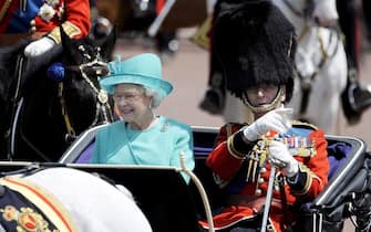 BritainÂ´s Queen Elizabeth II and her husband Prince Philip Duke of Edinburgh return to Buckingham Palace during Trooping the Colour in London, Britain, 14 June 2008. The event marks the QueenÂ´s official birthday - though in fact the monarch, 82, was born on 21 April 1926. The event showcases the British army at its ceremonial best. 1100 soldiers take part, all of them from the Household Division, whose special duty it is to guard the monarch. The parade comes from traditional battle preparations, where the colours, or flags, were paraded in front of troops so they could recognise them.  ANSA/FELIPE TRUEBA