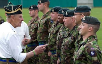epa09123980 (FILE) - A picture dated shows Britain's Prince Philip (L), Duke of Edinburgh visiting British troops in Paderborn, Germany, 29 July 2011 (reissued 09 April 2021. According to the Buckingham Palace, Prince Philip has died aged 99.  EPA/FRISO GENTSCH  GERMANY OUT *** Local Caption *** 02847282
