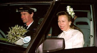Commander Tim Laurence (L) and  Britain's Princess Anne are seen in their car after their wedding at Crathie Church 12 December 1992 in Scotland. (Photo credit should read EPA/AFP via Getty Images)