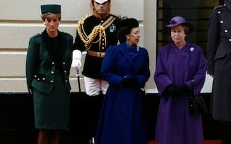 Queen Elizabeth with Princess Margaret and Princess Diana waiting to greet the Italian president Senior Cossiga