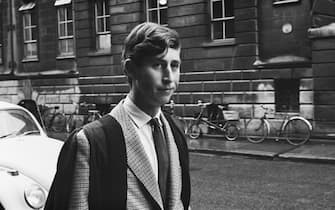 Prince Charles walking in Downing Street, Cambridge, UK, 12th October 1967. He is beginning his term at Trinity College.  (Photo by Peter Dunne/Daily Express/Getty Images)