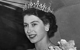 (FILES) In this file photo taken on June 7, 1951 Princess Elizabeth of Great Britain, the future Queen, waves to the people while wearing a diamond crown. - Queen Elizabeth II, the longest-serving monarch in British history and an icon instantly recognisable to billions of people around the world, has died aged 96, Buckingham Palace said on September 8, 2022. Her eldest son, Charles, 73, succeeds as king immediately, according to centuries of protocol, beginning a new, less certain chapter for the royal family after the queen's record-breaking 70-year reign. (Photo by AFP)