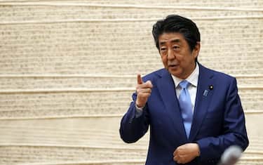 Shinzo Abe, Japan's prime minister, gestures as he speaks during a news conference in Tokyo, Japan, on Monday, May 4, 2020. Japan extended its nationwide state of emergency until May 31, with Abe saying the country’s coronavirus measures need more time to reduce infection rates. Photographer: Eugene Hoshiko/AP/Bloomberg