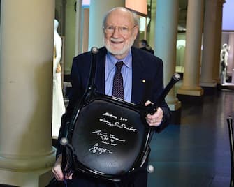 Irish William C Campbell, the Nobel Physiology or Medicine prize co-laureate, shows a chair he signed at the Nobel Museum in Stockholm, Sweden, on December 6, 2015. The Nobel Prize ceremony will take place in Stochkolm on December 10. AFP PHOTO /  TT NEWS AGENCY / Claudio Bresciani  +++ SWEDEN OUT / AFP / TT NEWS AGENCY / Claudio Bresciani        (Photo credit should read CLAUDIO BRESCIANI/AFP via Getty Images)