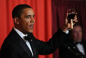 US President and Nobel Peace Prize laureate Barack Obama raises his glass as he makes a toast during the Nobel Banquet in Oslo on December 10, 2009. Obama on December 10 accepted the Nobel Peace Prize, uncomfortably acknowledging his role as a leader at war while insisting that conflict can be morally justified. AFP PHOTO/Jewel SAMAD (Photo credit should read JEWEL SAMAD/AFP via Getty Images)