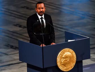 Ethiopia's Prime Minister and Nobel Peace Prize Laureate Abiy Ahmed Ali speaks after receiving the Nobel Peace Prize during a ceremony at the city hall in Oslo on December 10, 2019. - Abiy Ahmed is picking up his Nobel Peace Prize in the Norwegian capital as ethnic violence is on the rise at home, festivities are being kept to the bare minimum and he has refused to speak to the media cancelling this years Nobel Peace Prize press conference. (Photo by Fredrik VARFJELL / AFP) (Photo by FREDRIK VARFJELL/AFP via Getty Images)