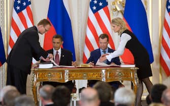 PRAGUE, CZECH REPUBLIC - APRIL 08:  U.S. President Barack Obama and Russian President Dmitry Medvedev sign the latest nuclear arms reduction treaty between the two countries, known as "new START", at Prague Castle on April 8, 2010 in Prague, Czech Republic. The treaty provides for a reduction in the two countries' arsenals to 1,550 warheads over seven years and is the most significant arms agreement between the U.S. and Russia in nearly twenty years.  (Photo by Lidove Noviny/Getty Images)