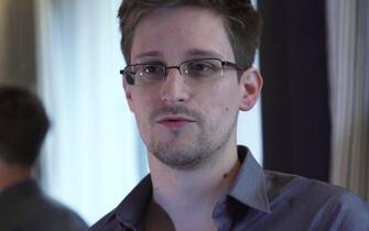 epa03738672 A video grab courtesy of The Guardian newspaper, London 10 June 2013 showing former CIA employee Edward Snowden during an exclusive interview with the newspaper's Glenn Greenwald and Laura Poitras in Hongkong. During the interview he revealed himself as the source of documents outling a massive effort by the US national security agency to track cell phone calls and monitor the e-mail and internet traffic of virtually all Americans.  EPA/Glenn Greenwald/Laura Poitras MANDATORY CREDIT: GUARDIAN/GLENN GREENWALD/LAURA POITRAS  EDITORIAL USE ONLY/NO SALES