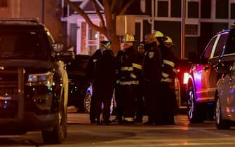 epa08251133 Members of the FBI and Milwaukee police gather outside the crime scene at the Molson Coors campus in Milwaukee, Wisconsin, USA, 26 February 2020. According to media reports, an employee who had been fired from the Molson Coors Brewing Company earlier in the day, returned and killed at least five employees before taking his own life.  EPA/MATT MARTON